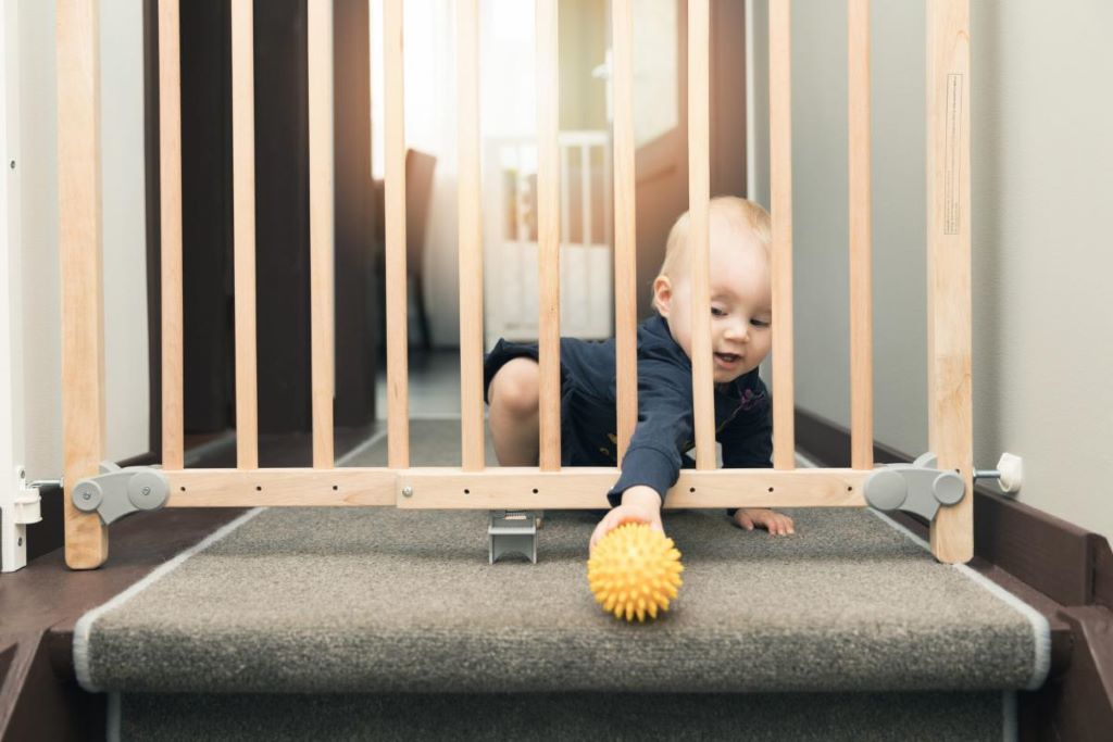What age should I stop using the baby gate?
