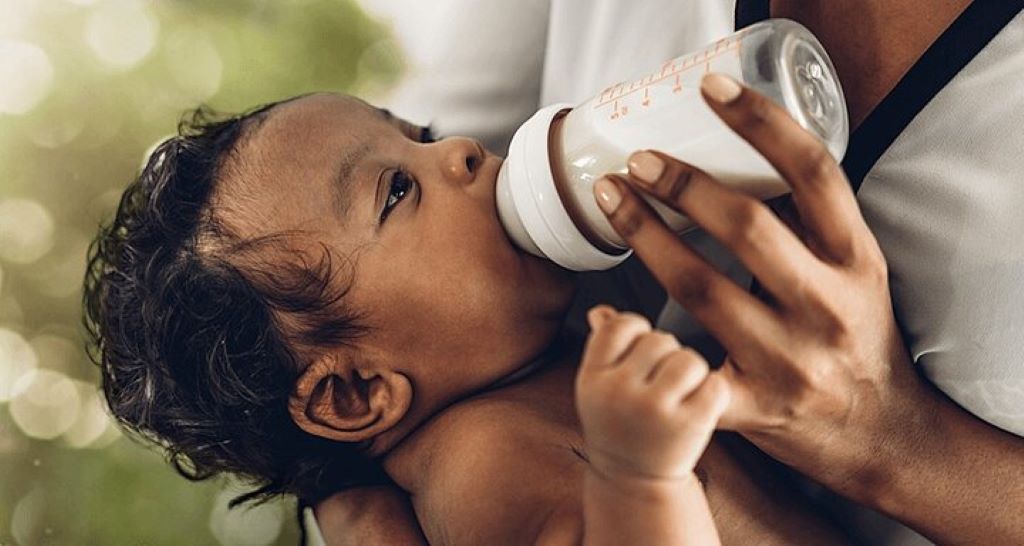 How do you bottle feed a baby paced bottle-feeding