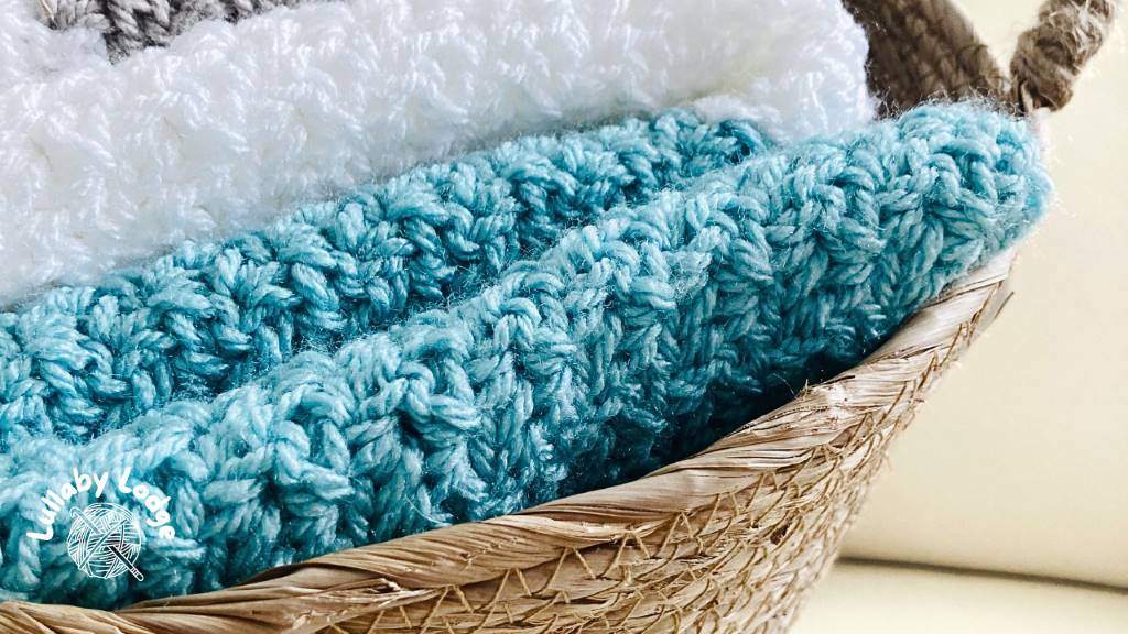 Cozy crochet baby blanket using machine-washable superwash merino.