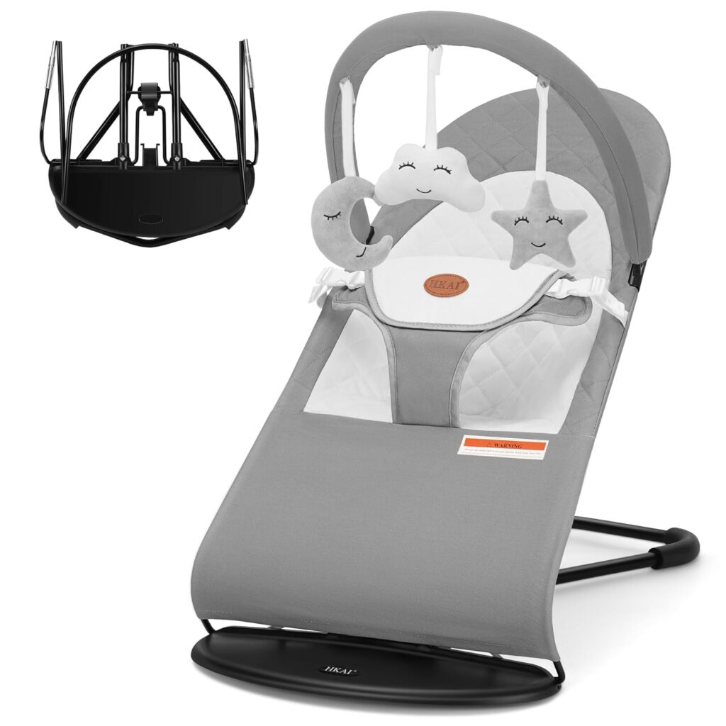 Portable HKAI Baby Bouncer in light grey, designed for infants 0-18 months, featuring 3 modes including rocker and stationary, made with 100% cotton fabric and equipped with hanging toys