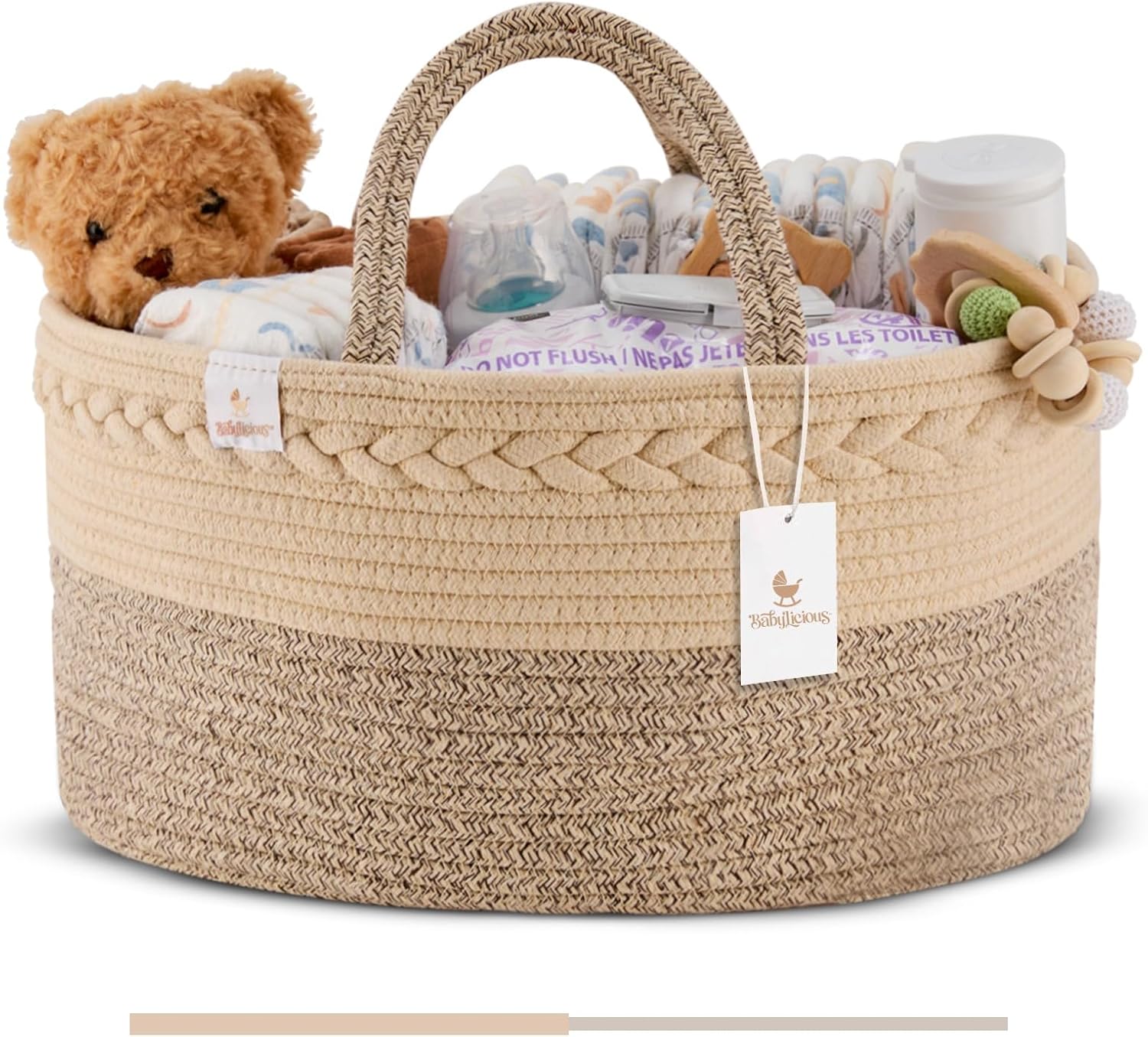 Parent holding an XL cotton rope baby diaper caddy organizer filled with diapers and wipes, ready for use at a changing table