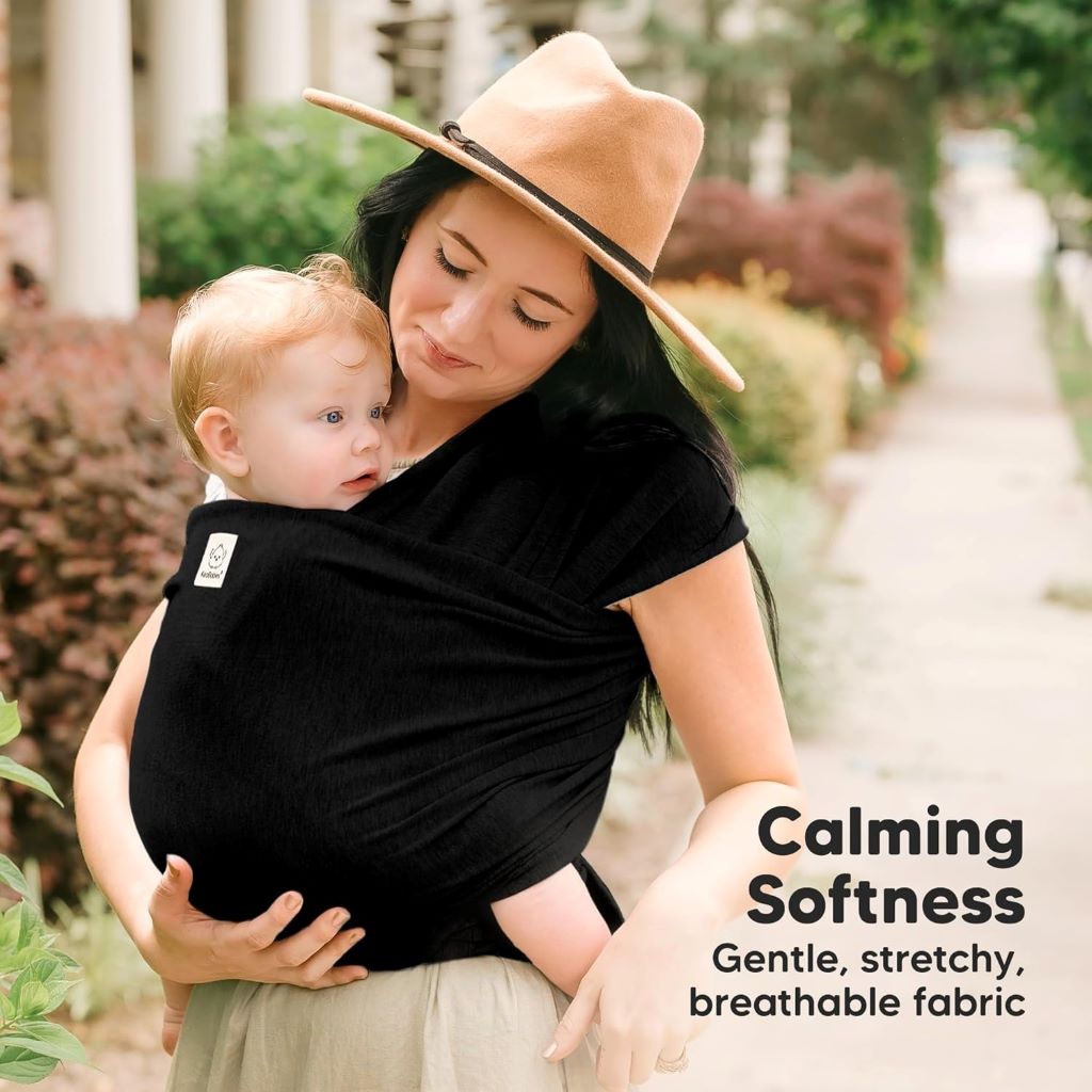 Close bonding with baby using KeaBabies all-in-one baby wrap carrier in trendy black