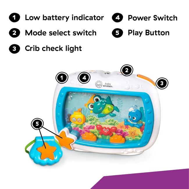 Baby Einstein Sea Dreams Soother attached to crib, glowing with ocean-themed lights and gentle sea characters.