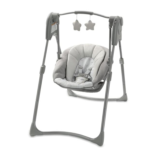 Graco Slim Spaces Reign compact baby swing in use