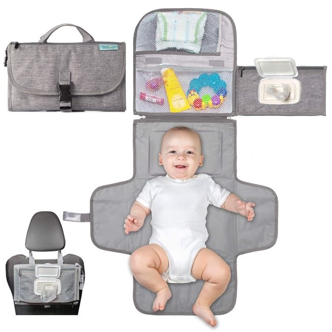 Kopi Baby Portable Diaper Changing Pad in grey, folded and ready for travel