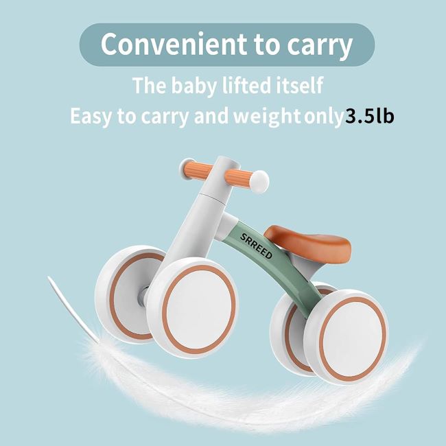 Baby riding SEREED balance bike, designed for toddlers learning to balance.