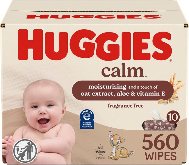 Huggies Calm Unscented Baby Wipes pack with push-button lid on a nursery table
