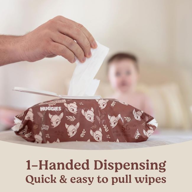 Parent using Huggies Calm hypoallergenic baby wipes on baby’s sensitive skin