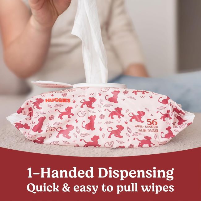 Parent using Huggies Nourish Scented Baby Wipes to gently clean baby’s hands.