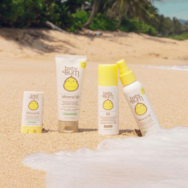 Fragrance-free Sun Bum Baby Bum SPF 50 travel sunscreen protecting delicate skin from UVA/UVB rays.