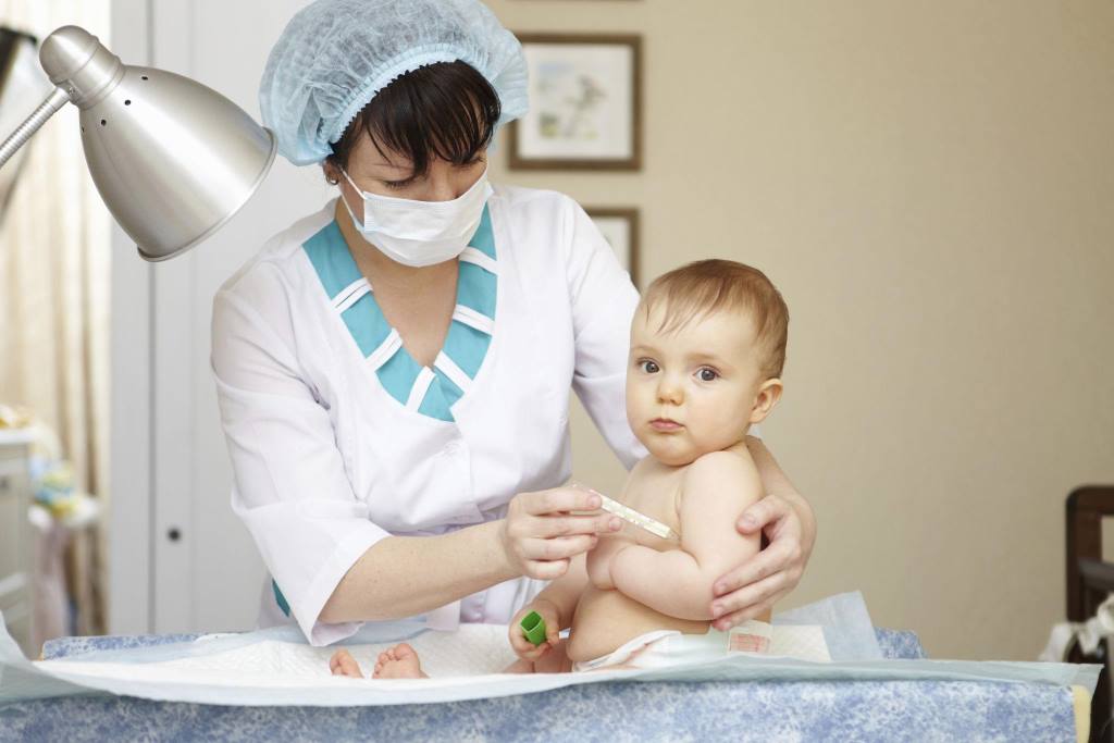 Baby healthcare and treatment. Medical symptoms. Temperature measurement