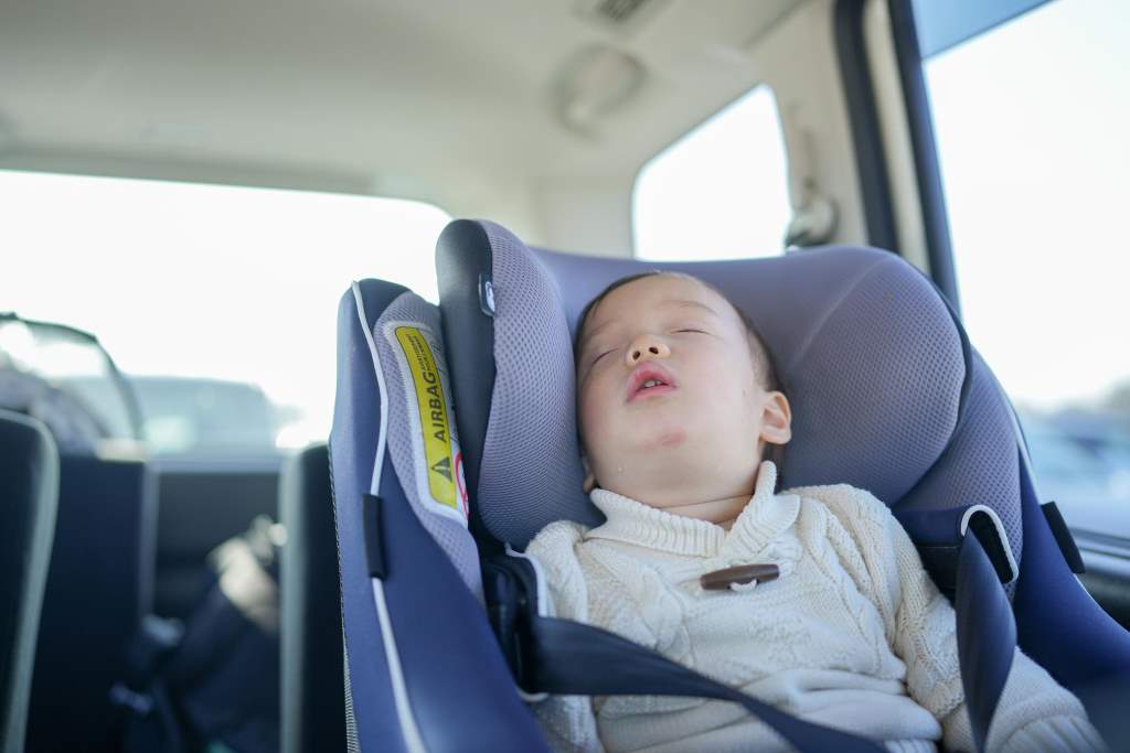 Baby sleeps soundly in car seat